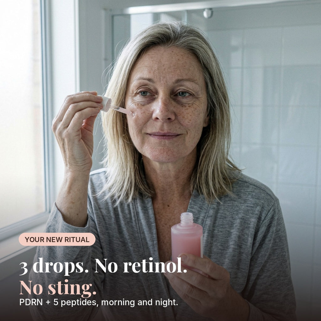 Woman in her 50s pressing PDRN serum into her cheek. 3 drops, no retinol, no sting.